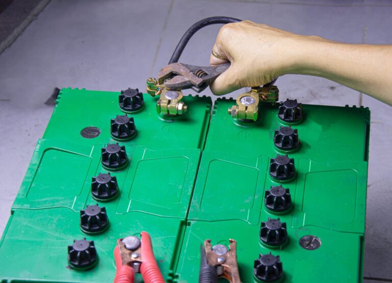 electrician-connecting-battery-terminals
